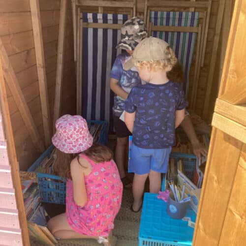 Children in beach hut 2023 blog
